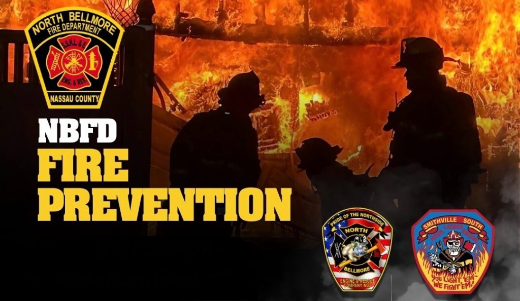 Silhouettes of firefighters stand in front of a large burning blaze. The North Bellmore Fire Department logo and two patches are visible, along with bold text reading "NBFD Fire Prevention.